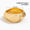 Bracciale rigido geometrico dorato spesso con diametro 6cm e larghezza 3cm modello - Bracciale Rigido Largo a Sfaccettature Geometriche (02595) / Oro