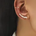 Elegant sparkling marquise-cut zircon ear crawler and gold cuff earring set for women - Marquise Zirconia Ear Crawler Set (DZ-520) / Two-Piece Set / Gold