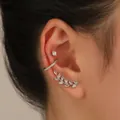 Elegant silver leaf ear cuff set with sparkling zirconia crystals on ear model - Silver Zirconia Leaf Earring Set (0233) / Three-Piece Set / Silver