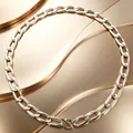 Macro close-up view of stainless steel rectangular link chain necklace with T-bar toggle clasp - Necklace / Steel