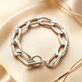 Close-up detail of silver stainless steel chain bracelet with a classic OT toggle clasp - Bracelet / Steel