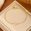 Elegant gold-tone bracelet featuring a sparkling four-leaf clover crystal stone pendant - Four-leaf Clover Bracelet (70186) / Gold