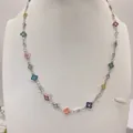 Elegant colorful enamel hollow four-leaf clover necklace with silver chain on mannequin - Silver (PXL236)