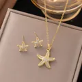 Gold starfish jewelry set featuring necklace and stud earrings with shiny crystals - Rhinestone Starfish Set (8227) / Gold