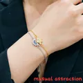 Elegant sun and moon charm link bracelets in gold and silver finish for women - Magnetic Sun and Moon Bracelet (E2251) / Multicolor