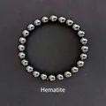 Polished 8mm hematite beaded stretch bracelet with deep grey metallic luster finish - Hematite