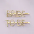 Barrettes à strass dorés avec lettrage « BRIDE TO BE » pour accessoires de mariée - Pinces à cheveux dorées polyvalentes HS-J6684G avec chaîne à griffes
