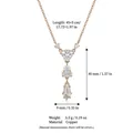 Rose gold-plated copper necklace with heart and teardrop crystal pendant dimensions. - Y-Shaped Long Rhinestone Necklace / Rose Gold