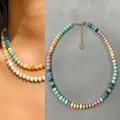 Elegant colorful semi-precious stone beaded choker necklace with a golden heart charm - Pink Blue Yellow & Gold Spaced