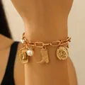 Retro Western Cowboy-Armband aus Legierung mit goldenen Stiefel- und Hut-Anhängern - Western-Stil Charm-Armband (5871) / Gold