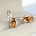 Elegante versilberte Ohrringe mit leuchtenden ovalen orangefarbenen AAA-Zirkonia. - Platiniert Champagner Zirkon