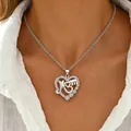 Elegant silver stainless steel heart necklace featuring Mom pendant and sparkling crystals - Mom Heart with Four Zirconia Style (22-0121)