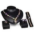 Elegante retro sieradenset met paarse edelstenen inclusief ketting en oorbellen - Goudpaarse Steen Vierdelige Set Stijl (07)