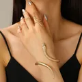 Exquisite gold-toned metal snake-shaped open ring and matching bracelet jewelry set - Bracelet and Ring Set in Gold (4380+7087)