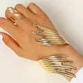 Premium gold-toned minimalist geometric wing bangle and open adjustable ring set - Bracelet and Ring Set in Gold (A-359+A-347)