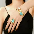 Adjustable gold-plated geometric bangle and ring set with teal iridescent faux stone inlay - Bangle & Ring Set in Gold Color (A-1164+10724)
