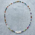 Detailed shot of Bohemian rainbow crystal beads with irregular white freshwater pearls - Short Choker Length / Colorful Crystal
