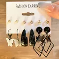 Retro alloy earring set featuring butterfly and geometric pendants on a white card - Butterfly Teardrop Geometric Style (HS554-7)