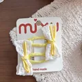 Süße cremegelbe Stoffschleifen-Haarspangen mit feiner weißer Spitze für Mädchen - 5-Snap-Clips mit bestickter Schleife