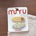 Handgefertigte süße gelbe Haarklammern aus Stoff mit Karo- und Blumenmuster für Mädchen - 8-Snap-Clips mit Karoknopf