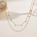 Macro detail of minimalist 18K gold plated titanium steel double layer necklace with rhombus charms - Rhombus Double Layer Necklace / Gold