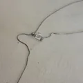 Minimalist silver snake chain necklace featuring a multifaceted clear crystal bead. - Single Sugar Cube Crystal Necklace