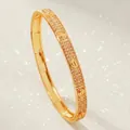 Sparkling gold-toned variant bangle featuring full zircon inlay and screw design - Gold Zirconia Inlaid Bangle BS-J5665G