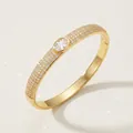 Luxury gold-plated bangle bracelet with shimmering pavé zircons and a central oval stone accent - Gold Casual Zirconia Bangles BS-J5666G