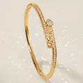 Elegant gold-plated open bangle with heart zircon and LOVE lettering in pavé setting - Gold Heart Bracelet BS-J5608G