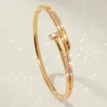 Elegant gold-plated nail bangle featuring shimmering zircon stones in a luxury finish - Gold Bridal Gown Bracelet BS-J5612G