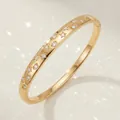 Luxury gold plated bangle bracelet featuring delicate star and round zircon stone inlay - Gold Sparkle Bangle BS-J5630G