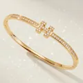 Luxury gold-plated bangle with sparkling zircon H-motif for elegant wedding and parties - Luxury H-shaped Bangle BS-J5637G