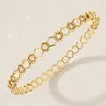 Elegant gold-toned honeycomb bangle bracelet featuring sparkling clear zircon inlays - Gold Birthday Party Bangle BS-J5589G