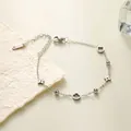 Elegantes silbernes Titanstahlarmband mit Blumenanhängern und kleinen Kristallen. - Armband (SL5095Y)