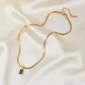 Elegante collar de cadena de espiga dorada con un colgante rectangular de circón negro - Oro Circonita Negra