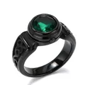Close-up detail of a vintage black titanium steel ring featuring a large faceted green gemstone - Size 7 / Black (Green Rhinestone)