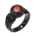Close-up of a men's black titanium steel ring featuring a vibrant red gemstone center - Size 7 / Black Tone Orange Red Zirconia