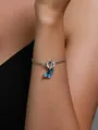 Silver tone chain bracelet featuring an elegant blue butterfly charm and OT toggle clasp - Gradient Blue Butterfly