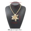 Detailed shot of a large gold-toned alloy floral necklace with dimension labels - Beaded Flower Style (N13902) / Gold