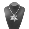 Detailed view of silver alloy flower pendant necklace on black display mannequin - Beaded Flower Style (N13903) / Silver