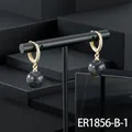 Elegant gold-plated hoop earrings with dark round semi-precious stone drops and paved zirconia - Iolite Hoop
