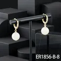Elegant gold-plated hoop earrings with white round gemstone drops and sparkling zircons. - Green Jade Hoop