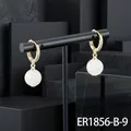Elegant gold-plated hoop earrings with white semi-precious stone drops and zircon - White Moonstone Hoop