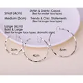 Pendientes de aro plateados trenzados disponibles en tres tamaños: 3 cm, 4 cm y 5 cm. - Clip Plata (3cm)