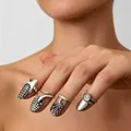 Detailed set of silver geometric rhinestone open nail rings for women on a hand model - Nail Ring Set (88) / Four-Piece Set / Silver