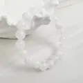 Elegant white semi-translucent acrylic beaded stretch bracelet for modern women - White Frosted Translucent Round Bead Bracelet (32773)
