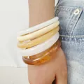 Stacked set of six colorful acrylic resin bangles in cream white and amber shades - Color Block Acrylic Ring Bangle 6-Piece Set (32886)