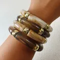 Chunky marbled acrylic tube bracelet set with gold spacers in brown and beige tones - Color Block Amber Pattern Acrylic Tube Bracelet Set (33294)