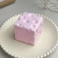 Soft pink cheese-shaped moldable squeeze toy for stress relief and sensory play - Vaseline Style Cheese Squishy / 5cm / Pink