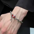 Punk style silver chain bracelet with red synthetic gems and cross charm on wrist - Punk Red Rhinestone Cross Bracelet (5689)